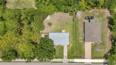 NO HOA - FENCED YARD - MINUTES TO CHARLOTTE HARBOR! This on Port Charlotte Golf Club in Florida - for sale on GolfHomes.com, golf home, golf lot