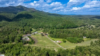 Tucked beside a quiet creek and backing up to The Rock Golf Club on The Rock At Jocassee in South Carolina - for sale on GolfHomes.com, golf home, golf lot