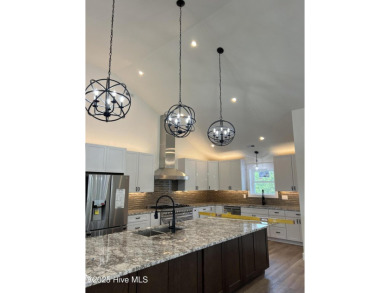 Luxury Living In COROLLA NC! Just under 6,000sqft of living on The Currituck Golf Club in North Carolina - for sale on GolfHomes.com, golf home, golf lot