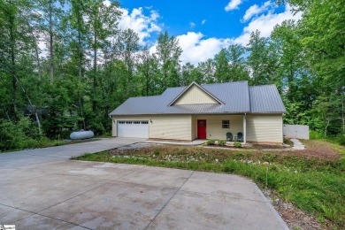 Tucked beside a quiet creek and backing up to The Rock Golf Club on The Rock At Jocassee in South Carolina - for sale on GolfHomes.com, golf home, golf lot