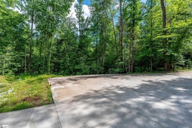 Tucked beside a quiet creek and backing up to The Rock Golf Club on The Rock At Jocassee in South Carolina - for sale on GolfHomes.com, golf home, golf lot