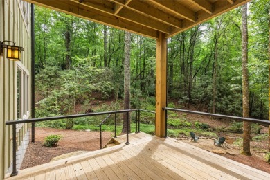 Discover the epitome of modern mountain living with this brand on Sapphire National Golf Club in North Carolina - for sale on GolfHomes.com, golf home, golf lot