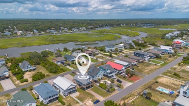 Perched on pilings and perfectly positioned to capture sweeping on Founders Club At St. James Plantation in North Carolina - for sale on GolfHomes.com, golf home, golf lot