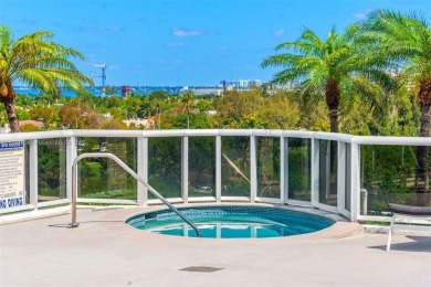 Live in one of the most serene areas of South Beach, directly on Miami Beach Golf Club in Florida - for sale on GolfHomes.com, golf home, golf lot