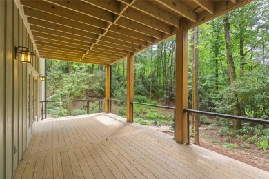 Discover the epitome of modern mountain living with this brand on Sapphire National Golf Club in North Carolina - for sale on GolfHomes.com, golf home, golf lot