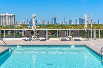 Live in one of the most serene areas of South Beach, directly on Miami Beach Golf Club in Florida - for sale on GolfHomes.com, golf home, golf lot