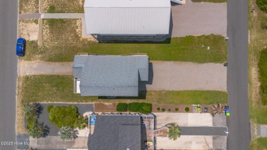 Perched on pilings and perfectly positioned to capture sweeping on Founders Club At St. James Plantation in North Carolina - for sale on GolfHomes.com, golf home, golf lot