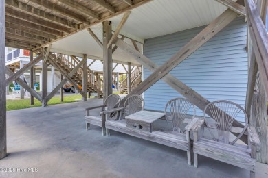 Perched on pilings and perfectly positioned to capture sweeping on Founders Club At St. James Plantation in North Carolina - for sale on GolfHomes.com, golf home, golf lot