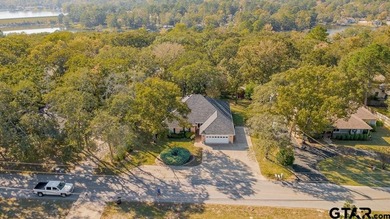 Welcome to 532 Dogwood Lane in the gated Hideaway Lake on Hide-A-Way Lake Golf Course in Texas - for sale on GolfHomes.com, golf home, golf lot