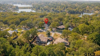 Welcome to 532 Dogwood Lane in the gated Hideaway Lake on Hide-A-Way Lake Golf Course in Texas - for sale on GolfHomes.com, golf home, golf lot