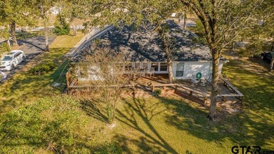 Welcome to 532 Dogwood Lane in the gated Hideaway Lake on Hide-A-Way Lake Golf Course in Texas - for sale on GolfHomes.com, golf home, golf lot