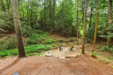Discover the epitome of modern mountain living with this brand on Sapphire National Golf Club in North Carolina - for sale on GolfHomes.com, golf home, golf lot