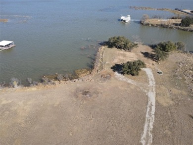 This lot is located on Lake Brownwood very close to the highly on Hideout Golf Club and Resort  in Texas - for sale on GolfHomes.com, golf home, golf lot