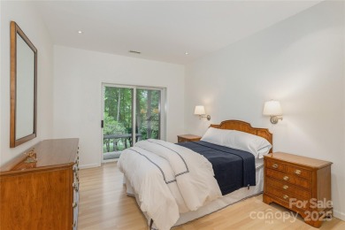 Discover your dream home nestled off of the picturesque 14th on Connestee Falls Golf Club in North Carolina - for sale on GolfHomes.com, golf home, golf lot