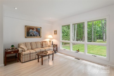 Discover your dream home nestled off of the picturesque 14th on Connestee Falls Golf Club in North Carolina - for sale on GolfHomes.com, golf home, golf lot