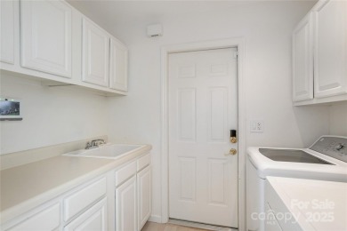 Discover your dream home nestled off of the picturesque 14th on Connestee Falls Golf Club in North Carolina - for sale on GolfHomes.com, golf home, golf lot