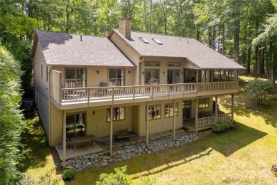 Discover your dream home nestled off of the picturesque 14th on Connestee Falls Golf Club in North Carolina - for sale on GolfHomes.com, golf home, golf lot