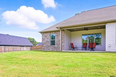 THIS GORGEOUS ONE-OWNER FAMILY HOME SITTING ON A HALF-ACRE LOT on Eagles Bluff Golf Course in Texas - for sale on GolfHomes.com, golf home, golf lot