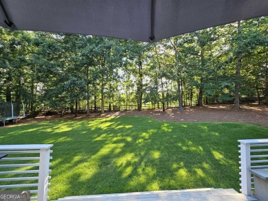 ELEVATED LUXURY MEETS EVERYDAY COMFORT! Professionally upgraded on Sugar Hill Golf Club in Georgia - for sale on GolfHomes.com, golf home, golf lot
