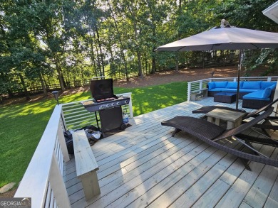 ELEVATED LUXURY MEETS EVERYDAY COMFORT! Professionally upgraded on Sugar Hill Golf Club in Georgia - for sale on GolfHomes.com, golf home, golf lot
