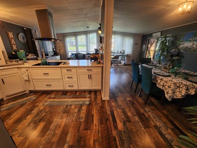 Rolling Greens Village is a friendly resort-style 55+ community on Rolling Greens Executive Golf Community in Florida - for sale on GolfHomes.com, golf home, golf lot