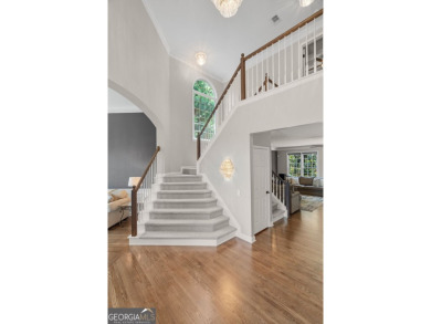 ELEVATED LUXURY MEETS EVERYDAY COMFORT! Professionally upgraded on Sugar Hill Golf Club in Georgia - for sale on GolfHomes.com, golf home, golf lot
