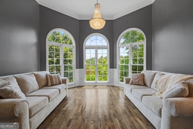 ELEVATED LUXURY MEETS EVERYDAY COMFORT! Professionally upgraded on Sugar Hill Golf Club in Georgia - for sale on GolfHomes.com, golf home, golf lot