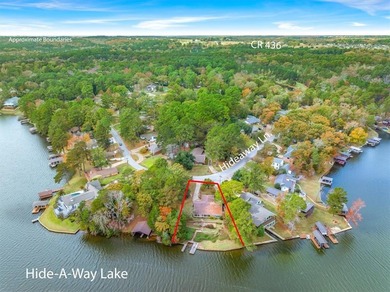 Welcome to lake living in one of the most sought-after gated on Hide-A-Way Lake Golf Course in Texas - for sale on GolfHomes.com, golf home, golf lot