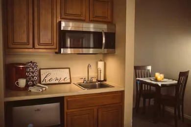 Whether you're searching for affordable living just West of on Ledgestone Country Club and Golf Course in Missouri - for sale on GolfHomes.com, golf home, golf lot