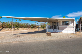 ON LEASED LAND*** Welcome home! This well maintained two bedroom on Havasu Island Golf Course in Arizona - for sale on GolfHomes.com, golf home, golf lot