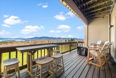 Incredible lake views from this Top of the World townhome. This on Top Of The World Golf Resort in New York - for sale on GolfHomes.com, golf home, golf lot