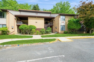 Covered Bridge at it's best! First floor corner unit. Light and on Pine Brook Golf Course in New Jersey - for sale on GolfHomes.com, golf home, golf lot