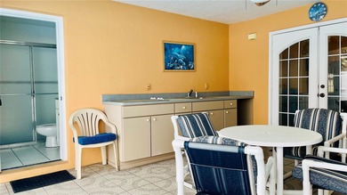 Welcome to 34 Woodfield Drive, a beautifully maintained on The Grand Club - Pine Lakes Course in Florida - for sale on GolfHomes.com, golf home, golf lot