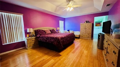 Welcome to 34 Woodfield Drive, a beautifully maintained on The Grand Club - Pine Lakes Course in Florida - for sale on GolfHomes.com, golf home, golf lot