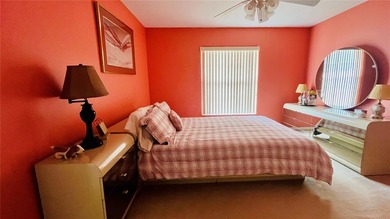 Welcome to 34 Woodfield Drive, a beautifully maintained on The Grand Club - Pine Lakes Course in Florida - for sale on GolfHomes.com, golf home, golf lot