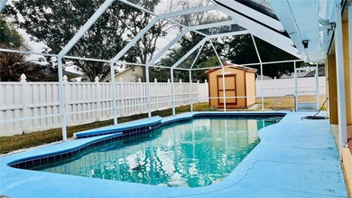 Welcome to 34 Woodfield Drive, a beautifully maintained on The Grand Club - Pine Lakes Course in Florida - for sale on GolfHomes.com, golf home, golf lot