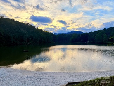 Tucked inside the gated community of Riverbend at Lake Lure on Lake Lure Municipal Golf Course in North Carolina - for sale on GolfHomes.com, golf home, golf lot