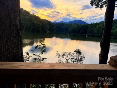 Tucked inside the gated community of Riverbend at Lake Lure on Lake Lure Municipal Golf Course in North Carolina - for sale on GolfHomes.com, golf home, golf lot