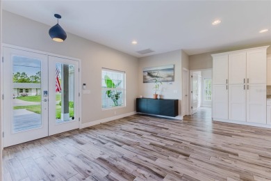 Experience the Best of Country Elegance and Modern Living in on Seminole Lakes Country Club in Florida - for sale on GolfHomes.com, golf home, golf lot