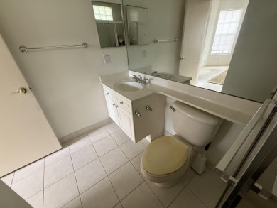 This 3-bedroom plus den, 3.5-bath home is located in the on Wycliffe Golf and Country Club in Florida - for sale on GolfHomes.com, golf home, golf lot