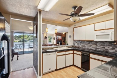 Check out this low-maintenance, waterfront townhome in the on De Cordova Bend Country Club in Texas - for sale on GolfHomes.com, golf home, golf lot