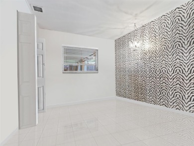 Welcome to this charming 3-bedroom, 2-bath home that perfectly on Babe Zaharias Golf Course in Florida - for sale on GolfHomes.com, golf home, golf lot
