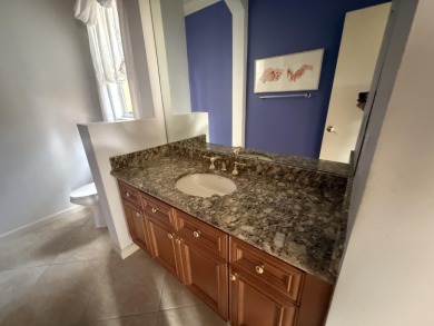 This 3-bedroom plus den, 3.5-bath home is located in the on Wycliffe Golf and Country Club in Florida - for sale on GolfHomes.com, golf home, golf lot