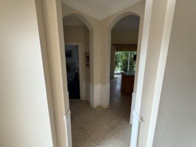 This 3-bedroom plus den, 3.5-bath home is located in the on Wycliffe Golf and Country Club in Florida - for sale on GolfHomes.com, golf home, golf lot