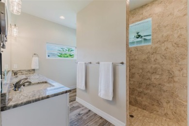 Experience the Best of Country Elegance and Modern Living in on Seminole Lakes Country Club in Florida - for sale on GolfHomes.com, golf home, golf lot