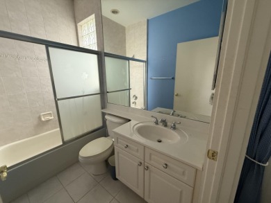 This 3-bedroom plus den, 3.5-bath home is located in the on Wycliffe Golf and Country Club in Florida - for sale on GolfHomes.com, golf home, golf lot