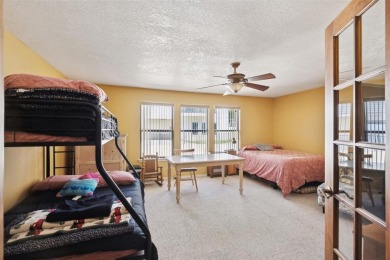 Check out this low-maintenance, waterfront townhome in the on De Cordova Bend Country Club in Texas - for sale on GolfHomes.com, golf home, golf lot