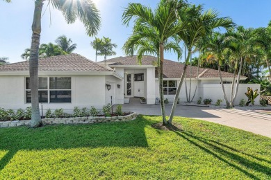 Nestled in the heart of Boca Raton's prestigious Hidden Valley on Ocean Breeze Golf and Country Club in Florida - for sale on GolfHomes.com, golf home, golf lot
