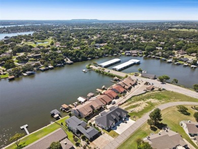 Check out this low-maintenance, waterfront townhome in the on De Cordova Bend Country Club in Texas - for sale on GolfHomes.com, golf home, golf lot