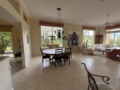 This 3-bedroom plus den, 3.5-bath home is located in the on Wycliffe Golf and Country Club in Florida - for sale on GolfHomes.com, golf home, golf lot